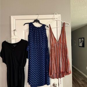 Elegant Women's Dress Collection in Black, Blue, and Rust
